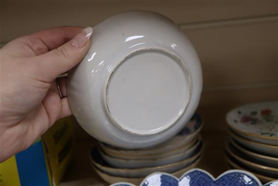 A group of 18th/19th century Chinese famille rose and blue and white saucers dishes tallest 23cm